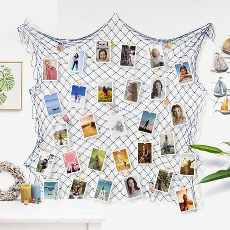 PRICES MAY VARY. Zuext Decorative Fish Net Photo Wall Perfect for Any Nautical Event, Pirate Party, Hawaiian Party, Birthday Party Or Beach Bashes Decorations; Best Mother's Day, Christmas and New Year's Decorations Imported Fish net with shells decorations, fit for any nautical themed party wedding birthday Display Memories with Mediterranean Style Decorative Fish Net: Show your stylish tastes by hanging your pictures in this unique fish net, Size - approx.79 x 40 inches Flexible and Versatile: Nautical Theme Party Decorations, Fishing Net Wall Decor, Nautical Kids Bedroom, Fish Net Decor, Sea Decoration, 21 Dinner, Photo Hanging, Nautical Bridal Showers, Nautical Themed Party