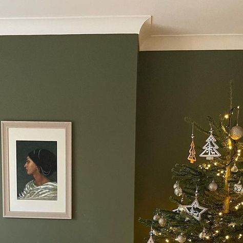 Farrow & Ball on Instagram: "A rich yet calming olive green, #Bancha really comes alive next to the beautiful tree in this dining space 🎄💚  📷 @peonyandprose #FarrowandBall" Moss Green Hallway, Wall Color For Small Spaces, Farrow And Ball Bancha Green, Olive Green Hallway Ideas, Farrow And Ball Stairs, Farrow And Ball Greens, Green Reading Room, Olive Hallway, Olive Green Walls Bedroom