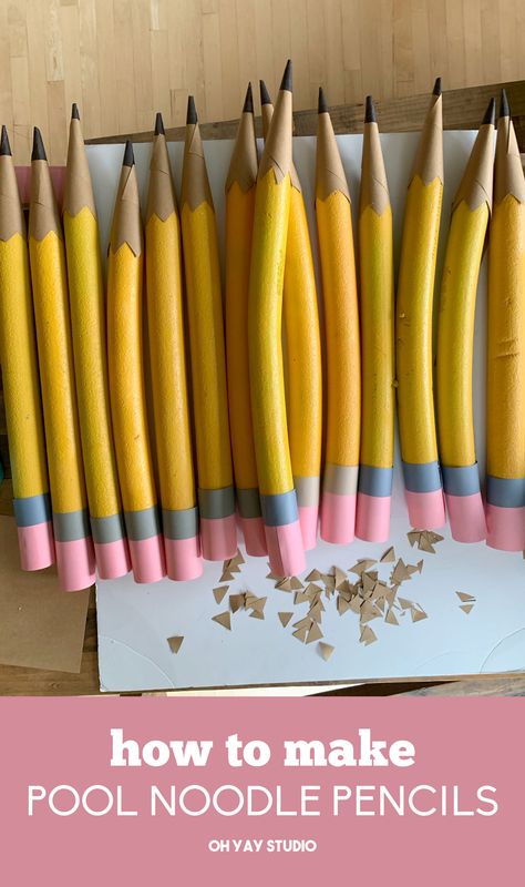 Diy Giant Pencil How To Make, Pool Noodle Classroom Decorations, Diy Large Pencil Prop, Pool Noodle Colored Pencils, Pool Noodle Letters Diy, Pencil Pool Noodle, Hanging Ideas For School Decoration Diy, How To Make A Giant Pencil, Pencil Diy Craft