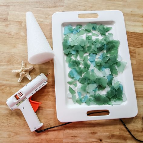 supplies to make sea glass christmas trees How To Make A Seaglass Christmas Tree, Beach Glass Christmas Tree Diy, Coastal Christmas Decorating Ideas, Diy Sea Glass Christmas Tree, Beach Glass Christmas Tree, Sea Glass Tree Diy, Diy Seaglass Art, Sea Glass Ornaments Diy, Sea Glass Christmas Tree Diy