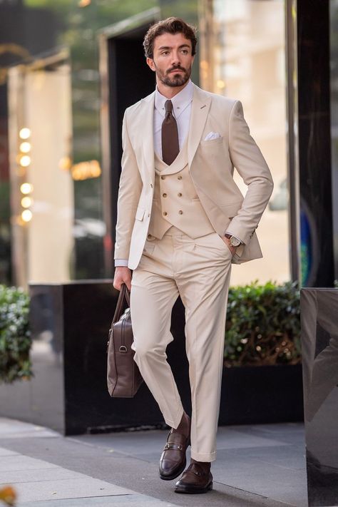 Command attention with the Beige Slim-Fit 3-Piece Suit from VIOSSI. The single-breasted blazer, boasting peak lapels and a refined 2-button closure, adds a modern flair. Pair it meticulously with the coordinating waistcoat and trousers for a distinguished, versatile ensemble. #slimfitsuit #beigesuit #peaklapels #mensfashion #elegantstyle #tailoredensemble #suitup #moderngentleman #formalwear #sophisticatedlook Beige Wedding Suit, 3 Piece Suit Men Wedding, Beige Suits For Men, Suits Groom, Double Breasted Tuxedo, Suit Styles, Suit Stores, Slim Fit Suit Men, Beige Suits