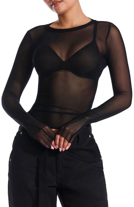 Make a modern style statement in this sheer mesh top fashioned with long sleeves and a jewel neckline. 22 1/2" length (size Medium) Jewel neck Long sleeves Sheer 95% nylon, 5% spandex Hand wash, line dry Imported Shear Black Top, Mesh Crop Top Long Sleeve, Sheer Black Top Outfit Aesthetic, Sheer Black Outfit, Style Sheer Top, Sheer Black Long Sleeve Top, Sheer Black Top Outfit Plus Size, Long Sleeve Sheer Top Outfit, Sheer Black Button Up Shirt Outfit