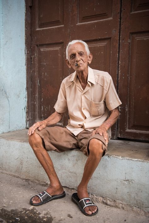 man in beige button-up shirt sitting in front of brown door Old Man Pictures, Life Drawing Reference, Human Figure Sketches, Ethical Clothing Brands, Indian People, Human Figure Drawing, India Photography, People Figures, Figure Reference