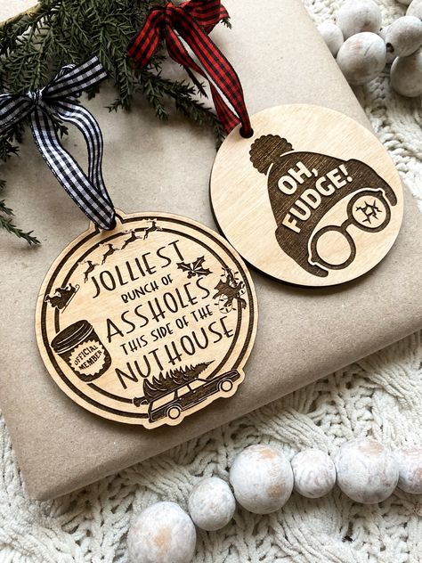 Wooden Christmas Ornaments DIMENSIONS/OVERVIEW: Height: 4 Inches; Width: 4 Inches; Depth 1/5 Inches Laser engraved and cut on birch wood. Each ornament comes ready to hang with red and white twine already attached for easy hanging or quick gifting. We can work with you to customize a design you love! Love the listing but don't like the wording? Send us a message and we can create a custom listing for you! OTHER DETAILS: All of our signs are 100% handmade in our home in Fairmont, WV. Current turn Christmas Wood Engraving Ideas, Wooden Engraved Ornaments, Xtool M1 Project Ideas Christmas, Laser Christmas Gifts, Christmas Engraving Ideas, Laser Engraved Christmas Gifts, Christmas Ornaments Laser Cut, Laser Ornaments Christmas, Laser Engraved Christmas Ornaments