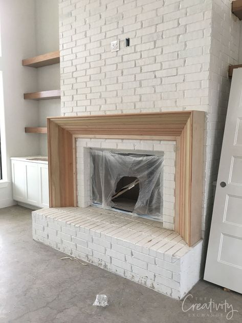 Client Project Updates: Back From Long Break Fireplace With Doors On Both Sides, French Country Fireplace Mantels, Brick And Cast Stone Fireplace, Brick Hearth Makeover, Fireplace Raised Off Floor, Low Profile Fireplace Hearth, New Construction Fireplace Ideas, Modernize Brick Fireplace, Removing Brick From Fireplace