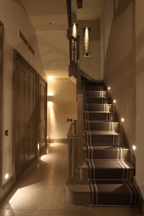 A common mistake when #installing #staircase #lighting is to forget the potential glare that will be caused when #walking up the #stairs. Well-designed #marker #lights will avoid this by being well #recessed into the #wall. For more #tips and #tricks when it comes to #staircase #lighting, take a look at our feature. Stairway Lighting Ideas, Basement Stair Lighting, Staircase Lighting Ideas, Stairway Lighting, Loft Stairs, Stair Remodel, Stairway Design, Staircase Lighting, Basement Stairs