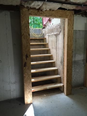 To prevent any drafts or unwanted pests in the basement, the team installed a new door frame and insulated the perimeter with Spray Foam. Basement Door Ideas Interior, Basement Door, Basement Foundation, Basement Doors, Basement Entrance, Door Makeover Diy, Old Greenwich, Basement Reno, Root Cellar