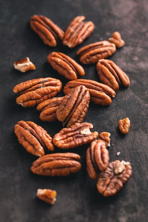 Macro photography of pecan nuts.