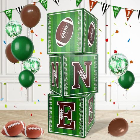 PRICES MAY VARY. 🏈Football Birthday Party Decorations: You will receive three football balloon boxes filled with rugby ball elements, each consisting of a rugby ball, and the letters N and E, which together spell "one", perfect for celebrating your child's first birthday! 🏈Unique Design: Our one boxes for 1st birthday are colorful and unique in design, using rugby ball elements to provide you with one-of-a-kind birthday party decorations, you can use your creativity to put some decorative ball My First Touchdown Birthday, 1st Year Down Football Birthday Centerpiece, First Down 1st Birthday Party, Sports Themed 1st Birthday Boys, Sports 1st Birthday Party Boys, One Year Down Football Birthday, Football Theme First Birthday, 1st Down Football Birthday Party, 1st Birthday Football Theme