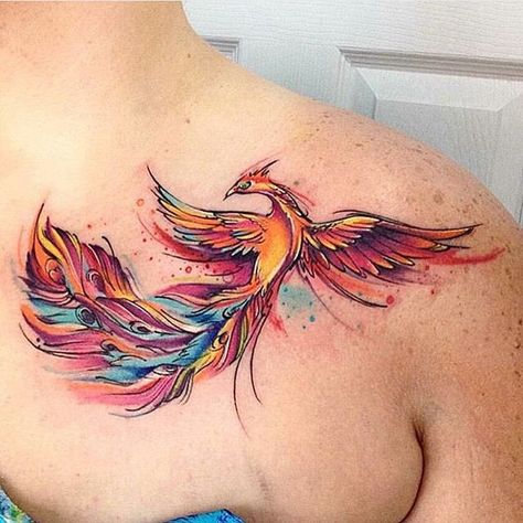 watercolor-phoenix-tattoo-placement-on-shoulder Watercolor Phoenix Tattoo, Tato Phoenix, Front Shoulder Tattoos, Phoenix Bird Tattoos, Tato Dada, Phönix Tattoo, Tato Dengan Makna, Vogel Tattoo, Kunst Tattoos