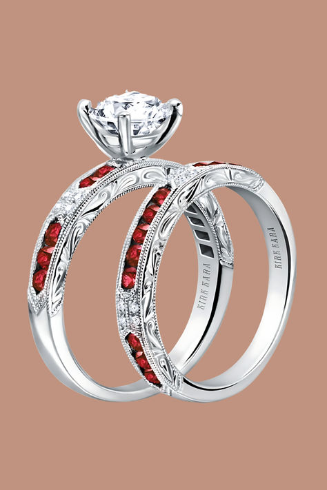 Embrace the timeless charm of our Kirk Kara's artistic ruby gemstone deco-inspired engagement ring from the Charlotte collection. This exquisite design showcases the rich velvety color of 10 round rubies with sparkles from a delicate 0.03 carat total weight of round cut diamonds, creating a harmonious blend of sophistication and vibrant elegance. 🌹💖💎✨ Engagement Rings With Rubies, Ruby And Diamond Engagement Ring, Diamond And Ruby Engagement Rings, Kirk Kara Engagement Rings, Ruby Engagement Ring Set, Blue Engagement Ring, Diamond Wedding Sets, Ruby Engagement Ring, Antique Inspiration