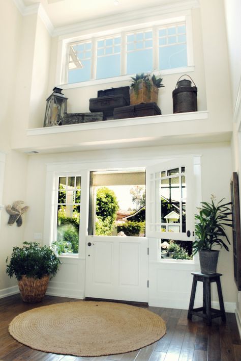 Hmmm - storage about the door?  Maybe a little paint color too... VL Decor For High Ledges, High Ledge Decorating Ideas, Plant Ledge Decorating, Window Ledge Decor, Wide Front Doors, Plant Ledge, Ledge Decor, Casa Loft, Plant Wall Decor