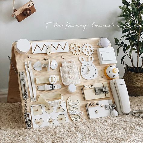 Baby Busy Board Diy Accessories Montessori Education Games Kids Learning Skill 🔆 #MontessoriBed #ChildFurniture #ToddlerRoomDecor #NaturalMaterials #WoodenToys #KidsRoomInspiration #MontessoriHome #EcoFriendlyKids #ToddlerSleep #ParentingIdeas Baby Busy Board Diy, Baby Busy Board, Baby Activity Board, Diy Busy Board, Handmade Kids Toys, Busy Board Baby, Education Games, Busy Boards For Toddlers, Games Kids