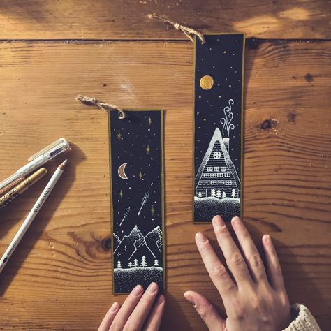 #bookmarks #drawing #blackpaper #golden #whitepen #nightsky #mountains #cottage Drawing Ideas Black And White, Bookmark Drawing Ideas, Drawing Ideas Black, Bookmark Drawing, Bookmarks Quotes, Handmade Bookmarks Diy, Felt Bookmark, Creative Bookmarks, Bookmark Craft