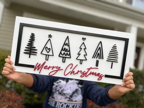 This beautiful sign is made from 1/4 mdf backdrop and layered with 1/4 in maple plywood for the details.   Spray painted  It comes with a hanger on the back Measurements: 20in by 9in Thanks for your purchase and Happy Holidays! Mantel Decor Christmas, Handmade Christmas Signs, Christmas Mantel Decor, Winter Door Decorations, Black And White Christmas, Christmas Mantel, Christmas Mantel Decorations, Merry Christmas Sign, Christmas Signs Wood