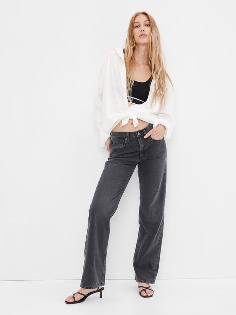 Fit: A full-length loose jean that's fitted on the waist & relaxed all the way down.  Size down for a slimmer fit.  Fabric: 99% Organic Cotton, 1% Stretch.  Stretch: Low Stretch Jeans.  Authentic denim with a soft & easy lived-in feel. ​ Rise: Mid Rise Jeans.  Look: A distressed five-pocket jean in a medium wash with fading & whiskering.  Undone split hems.  Details: Zip fly & five-pocket styling.  Responsibly Made: This pair of jeans is part of our water-saving Washwell program.  Compared to co Jeans Look, Jeans Cargo, Loose Jeans, Black Denim Jeans, Boot Cut Denim, Cargo Jeans, Gap Jeans, Mid Rise Jeans, Stretch Jeans