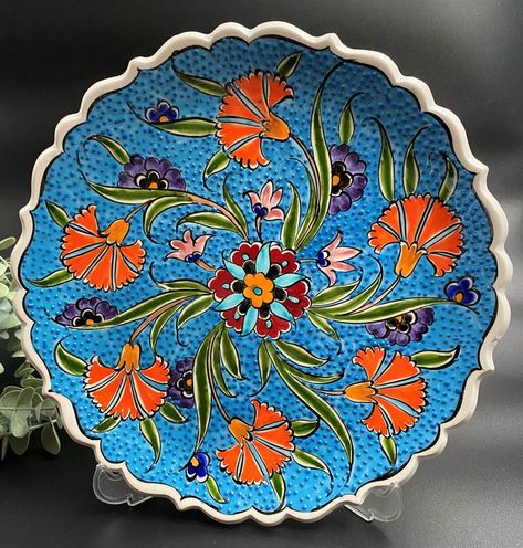 This handmade turkish tile & ceramic plate, is historical and traditional product. It is made in my own workshop. It is completely handmade. Hand drawn and painted. Baked at 950 degrees Celsius. Colors do not fade, always remain bright and vibrant Every tile is unique because it is handmade. Dimensions: Diameter: 10" (25 cm) Turkish Tile, Tile Ceramic, Turkish Ceramics, Hanging Plates, Ceramic Plate, Diy Art Painting, Ceramic Plates, Wall Colors, Diy Art