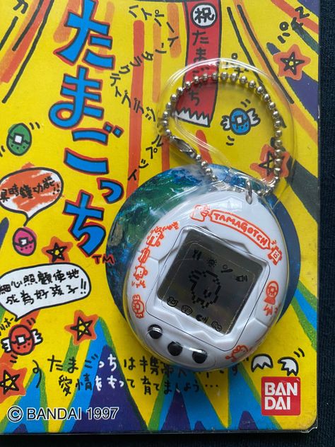 Bandai 1997 Tamagotchi White Color Ver Electronic Virtual Pet Digivice Toy. Virtual Pet Size: 4.5 cm x 5 cm x 2 cm Large. The Package Size: 10 cm x 20 cm Large,Japanese Version. In Brand New Condition.Mint in Plastic Card Package,Vintage Item. Original Made in Bandai 1997,Don't Miss the Rare item. Tamagotchi Color, Virtual Pet, Plastic Card, White Color, Hong Kong, 20 Cm, Action Figures, Vintage Items, Size 4