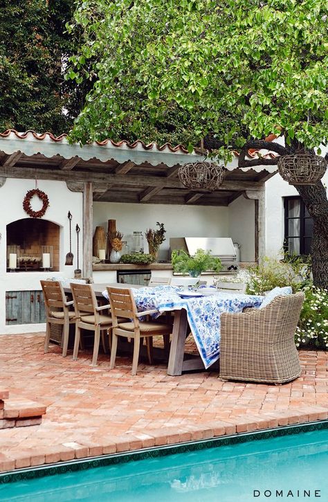 If you like the look of warm, welcoming old-world homes, Spanish Revival might be the style for you. We've already explored some of the classic architectural and interior elements of this type of design. Now, let's take a peek inside some kitchens to see how the style is expressed in the heart of the home. :) Spanish Porch, Backyard Dining Area, Spanish Courtyard, Backyard Dining, Outdoor Kitchen Design Layout, Spanish Style Home, Rustic Kitchen Design, Casas Coloniales, Spanish Style Homes