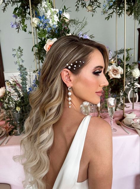 Wedding Hairstyles With Pearls Down, Middle Part Pearl Hair, Pearls In Hair Wedding Hair Down, Simple Bridal Hair And Makeup, Retro Curls Wedding Hair, Slicked Hair With Pearls, Bride Summer Hairstyles, Hairstyles With Earrings, Pearls In Wedding Hair