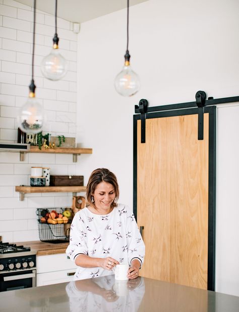 This Waihi home is a lesson in industrial-meets-beach style Industrial Beach Decor, Industrial Coastal, Fish Hoek, Beach House Decor Coastal Style, Boho Beach House, Wooden Barn Doors, Green Barn, Barn Style Doors, Glass Barn Doors