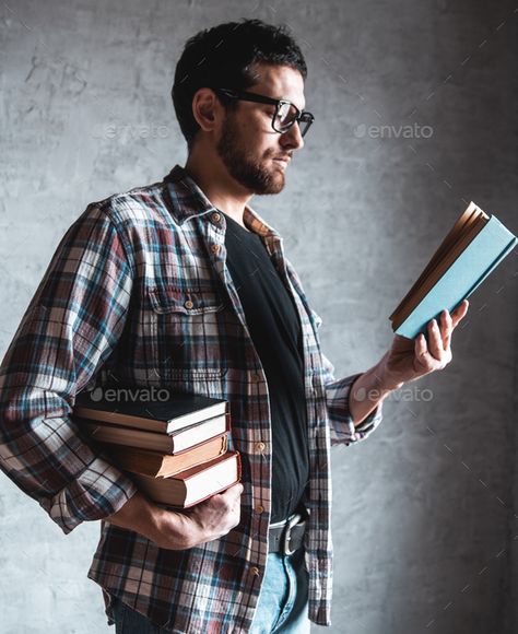 Man reading. Book in his hands. education, development, knowledge by serbogachuk. Man reading. Book in his hands. education, development, knowledge #Sponsored #Book, #hands, #Man, #reading Reading A Book Pose Drawing, Man Reading Book, Library Photo Shoot, Tech Outfit, Portfolio Booklet, Man Reading, Male Pose Reference, Body Reference Poses, Business Portrait