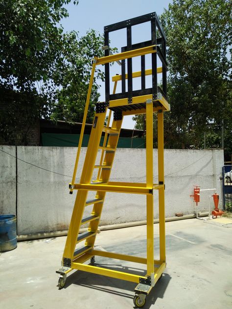 This mobile maintenance platform Ladder is specially designed for working around electricity, its non conductive material & heavy duty construction provides safety jobs where electrical lines are present. This ladder has a FRP platform of size 600mm(W) X 800mm(L), which gives safety with comfort to the user. The ladder has spring loaded wheel, to move ladder easily. Mobile Maintenance, Simple Furniture Design, Platform Ladder, Lifting Devices, Garage Tool Storage, Simple Furniture, Garage Tools, Work Culture, Mechanical Design