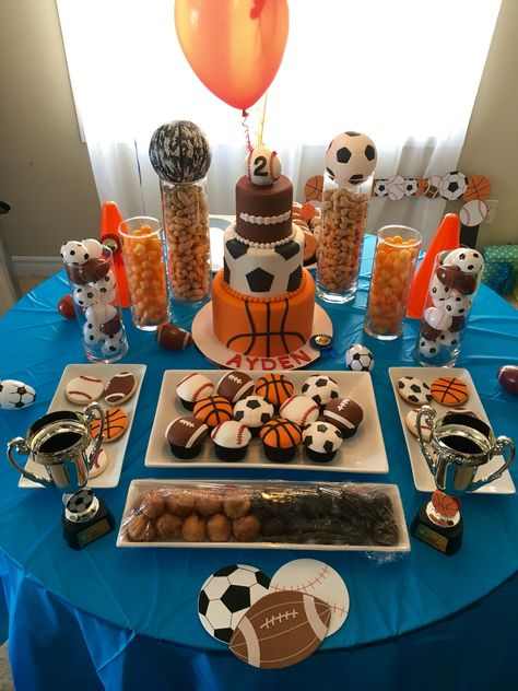 Sports Birthday Theme - Dessert Table for Ayden's 2nd Birthday - basketball baseball soccer football - sports cupcake - sports cookies - champion - balls - sweet table Sport Cupcakes, Sports Baby Shower Theme, Baby Shower Games Coed, Sports Baby Shower, Basketball Birthday Parties, Sports Theme Birthday, Ball Birthday Parties, Sports Birthday Party, Boy Baby Shower Ideas