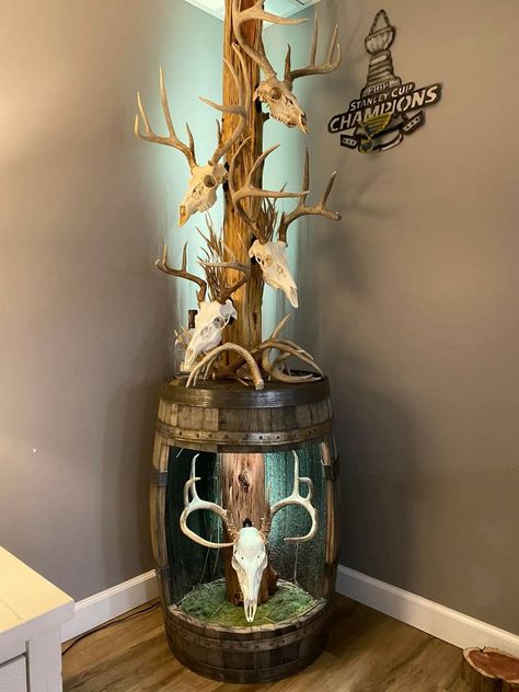 Deer Head Mounts Ideas, Deer Skull Living Room, Deer Taxidermy Ideas, European Deer Skull Mount Ideas, Unique Deer Mounts, Whiskey Barrel Deer Mount, Deer Mount Pedestal, Pedestal Deer Mount Ideas, Hunting Storage Room