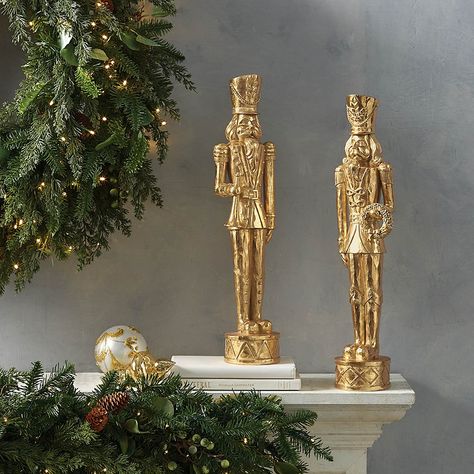 A pair of golden nutcrackers stand ready to bring holiday cheer, nostalgia and twinkle to your home. Known for inspiring well-being and good fortune, these artfully detailed figures present a Christmas wreath and celebratory golden horn. Each nutcracker figure is molded from a hand-crafted original sculpture and handpainted. Polyresin and stone powder figure. Handpainted. Hand-finished. Wipe clean with a soft, dry cloth. For indoor display only; not for use as a toy. Imported . A Frontgate exclusive.At Frontgate, our primary focus is quality. We guarantee that every product we sell will stand up to the supreme test   our customers' satisfaction. To learn more about our policies, visit our Shipping & Processing, Returns & Exchanges and Warranty & Price Guarantee pages. Nutcracker Figures, Indoor Holiday Decor, Stone Powder, Golden Horn, Classic Christmas Decorations, Nutcracker Soldier, Classy Christmas, Gold Christmas Decorations, Gold Holiday