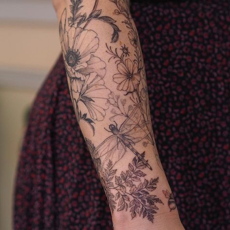 Flower Patch Sleeve Tattoo, Garden Half Sleeve Tattoos For Women, Mandala Wildflower Tattoo, Filler Nature Tattoos, Graden Sleeve Tattoo, Garden Half Sleeve Tattoo, Nature Upper Arm Tattoo, Flower Patchwork Sleeve Tattoo, Vine With Flowers Tattoo Sleeve