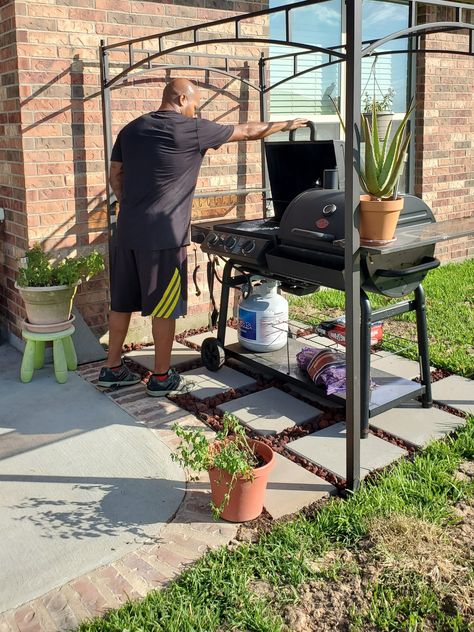 After we extended our patio in 2017 we realized that we had everything EXCEPT a {semi-}permanent home for the grill.    We didn't want a patio that spanned the length of our home or anything that couldn't be changed later if we wanted to.    In our previous home we extended our patio with pavers & let the grass grow in between for an English garden look & feel. We decided to use a similar technique to make a grill landing pad.    How To Make A Grill Landing PadUsing pavers & lava roc Grill Areas Outdoor Diy Backyard, Paver Area For Grill, Pavers To Extend Patio, Patio Extended With Pavers, Paver Patio For Grill, Diy Backyard Grill Area, Small Paver Pad For Grill, Grill Pad Off Patio Diy, Extend Back Patio