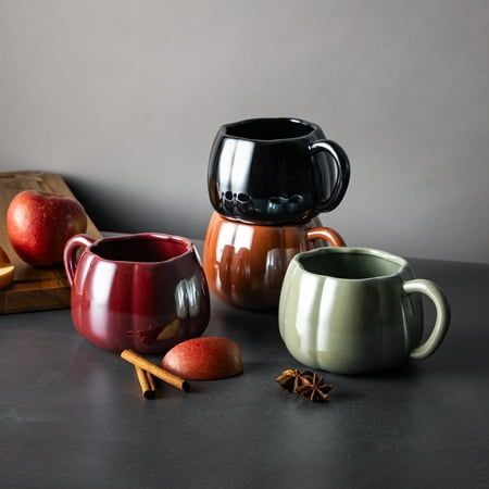 Enjoy your favorite hot beverages in style with the Thyme & Table 4-Pack 16oz Pumpkin Pearl Coffee Mugs. These elegant mugs feature a stunning pumpkin pearl finish that adds a touch of sophistication to any kitchen or dining space. With a generous 16oz capacity, they are perfect for serving coffee, tea, hot chocolate, or any warm drink you love. Made from high-quality materials, these mugs are durable and designed to keep your beverages at the perfect temperature. The set of four ensures you alw Pumpkin Coffee Mug, Coffe Decorations, Coffee Shop Mugs, Autumn Coffee Table Decor, Pumpkin Mugs, Fall Coffee Mugs, Pretty Coffee Cups, Autumn Mugs, Fall Mugs