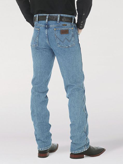 LONG-LASTING DENIM IN A POPULAR FIT Once you find the perfect fit, there's just no going back. These Cowboy Cut® slim fit jeans place a modern spin on our most popular Western style, the 13MWZ. With 20% longer lasting denim and a more comfortable waist, the Wrangler® Cowboy Cut® men's jeans are guaranteed to get you where you need to go and keep you feeling comfortable. Our Premium Performance Cowboy Cut® slim fit jeans come fully equipped with all the authentically Western details you know and Vintage Wrangler Jeans Outfit, Mens Western Style, Cowboy Jeans, Sunday Clothes, Wrangler Cowboy, Open Roads, Jeans Outfit Men, No Going Back, Wrangler Cowboy Cut