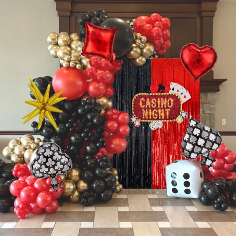 PRICES MAY VARY. **Ultimate Casino Theme Party Decorations**: Elevate your party with this deluxe set: 48 sleek black balloon (18inch*1, 10inch*20, 5inch*27), 48 vibrant red balloon (18inch*1, 10inch*20, 5inch*27), 47 shimmering metallic gold balloons (10inch*20, 5inch*27), 1 starburst balloon (22"), 4 casino poker balloons, 1 dice balloon, 2 foil curtain backdrops (1x2m each in red and black), glue dots*100, and 1 ribbon. **Casino Party Decorations**: Perfect for a wide range of celebrations in Red Gold Balloon Garland, Casino Prom Theme, Casino Night Party Decorations, Poker Decorations, Black Gold Party Decorations, Casino Royale Theme Party, Starburst Balloon, Vegas Prom, Party Decorations Black