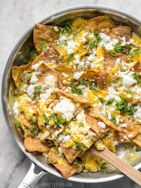 Green Chile Migas is a fast and inexpensive egg dish that is flavorful and filling any time of day, not just for breakfast! BudgetBytes.com Chilaquiles Recipe Mexican, Migas Recipe, Chilaquiles Recipe, Authentic Mexican Recipes, Mexican Breakfast Recipes, Mexican Breakfast, Budget Bytes, Egg Recipes For Breakfast, Egg Dish