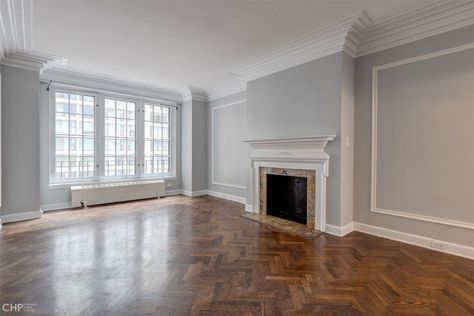 421 W Melrose, Unit 7D, Chicago, IL 60657 - Lakeview Chicago Interiors, Chicago Interior Design, Art Deco Tiles, Picture Frame Molding, Herringbone Design, Brown Line, Public Transportation, Roof Deck, Spacious Living Room