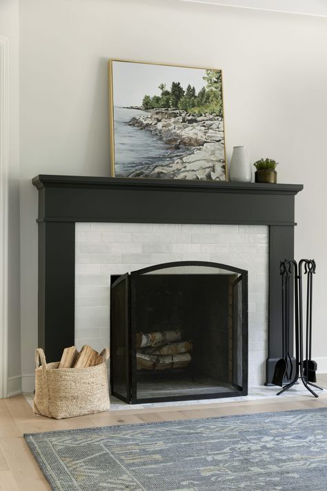 Timeless Whole House Renovation | Jkath Design Build + Reinvent Black Fireplace With Tile Surround, Matte Black Fireplace Mantles, Black And White Tile Fireplace Surround, Black Fireplace White Walls, Black White Fireplace, Jkath Design, Slate Fireplace Surround, Black Fireplace Surround, Benjamin Moore Wrought Iron