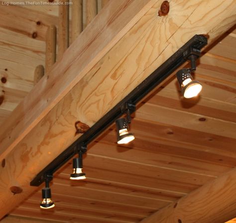 Track lighting that works well in a log cabin home. Purchased from Lowes. photo by Shelley Cabin Light Fixtures, Kitchen Lighting Fixtures Track, Log Cabin Lighting, Rustic Track Lighting, Log Cabin Kitchen, Vaulted Ceiling Lighting, Rustic Log Home, Log Cabin Ideas, Track Lighting Fixtures