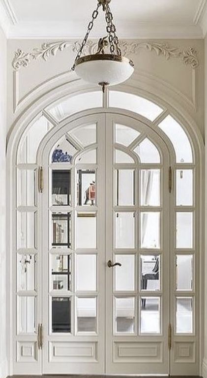 Parisian Doors, Arched French Doors, Parisian Living Room, White French Doors, Frameless Glass Doors, French Apartment, Doors And Floors, French Doors Patio, Luxury House Interior Design