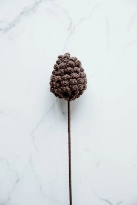 crochet pine cone|hookok Crochet Pine Cone, Easter Crochet Patterns Free, Cone Pattern, Flower Projects, Christmas Craft Show, Winter Holiday Crafts, Wool Work, Flowers Crochet, Winter Bouquet