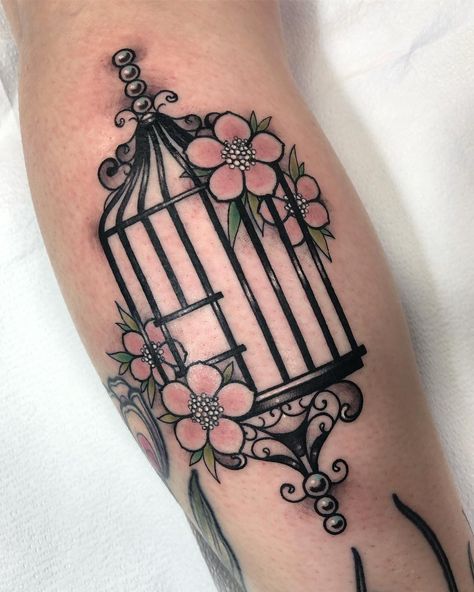 Birdcage Tattoo | Tattoo Ideas and Inspiration | Morgan Reynolds Bird And Cage Tattoo Freedom, Birdcage Tattoo, Cage Tattoo, Bird Tattoos Arm, Freedom Tattoos, Seashell Tattoos, Cage Tattoos, M Tattoos, Flower Tattoo Arm