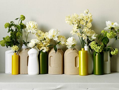 HOUSEHOLD CONTAINERS you know the ones…dish soap, detergent, shampoo, and shower gels have interesting silhouettes that when stripped of their labels take on new life. To achieve this look, start by cleaning out each container thoroughly, (these are a mix of flat and pearly finishes) and place a few small rocks in the bottom of each bottle to give weight. Fill with soft and full, like-colored blooms to complete! Vintage Inspired Wedding Dresses, Wedding Reception Centerpieces, Anthropologie Wedding, Wedding Inspiration Board, Diy Centerpieces, Vintage Inspired Wedding, Diy Stuff, Vintage Inspired Dresses, Dresses Vintage