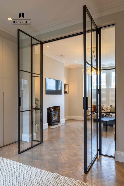 Glass Doors Between Rooms, Black Glass Door Living Room, Internal Steel Glass Doors, Glass Wall Between Kitchen And Living, Crittal Doors Living Room, Internal Room Divider Doors, Kitchen And Living Room Partition, Internal Glass Doors Living Rooms, Glass Divider Wall Living Rooms