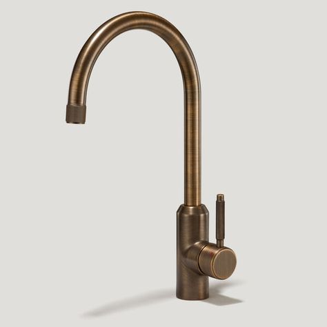 Finally, the perfect kitchen mixer tap to match your cabinet hardware is here. Introducing our Kitchen Taps collection, available in two contemporary silhouettes. PORTMAN is the taller, more elegant style of the two, with a beautifully curved swan neck that sits proudly upon kitchen worktops. If you have a spacious kitchen with a sink overlooking a window view, or sat centrally on a kitchen island, PORTMAN is the tap for you.Choose from our core range of hardware finishes; Brass and Antique Brass. Complement your PORTMAN kitchen mixer tap with your cabinet hardware, or choose a contrasting finish — that's pretty on trend right now, we hear. Better still, select textured spout and handle details that marry-up with your textured hardware. Whether knurled, swirled, grooved or smooth, these di Antique Brass Kitchen Handles, Kitchen Taps And Sinks, Brass Kitchen Tap, Brass Kitchen Hardware, Closet Bar, Interior Layout, Spacious Kitchen, Brass Tap, The Perfect Kitchen