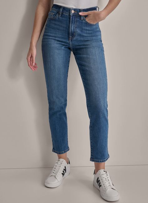 High-riseSlim, straight letFive-pocket stylingFront button and zip closureHem hits at ankle... Slim Straight Jeans, Donna Karan, Bottom Clothes, High Jeans, Straight Jeans, Houston, Straight Leg, High Rise, Clothes For Women