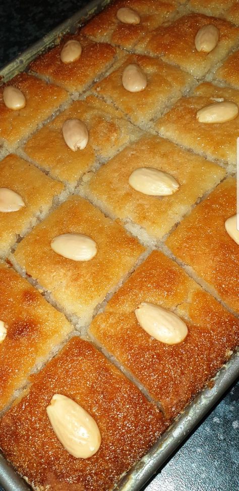 Namoura (Lebanese semolina cake) | Semolina cake, Lebanese desserts recipes, Party food dessert Namoura Recipe, Lebanese Desserts Recipes, Basbousa Recipe, Arabisk Mad, Lebanese Desserts, Eid Cake, Arabic Desserts, Almond Meal Cookies, Arabic Dessert