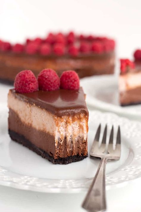 This delicious layered chocolate raspberry cheesecake makes the perfect dessert for any occasion! #cheesecake #chocolate #raspberrycheesecake #baking #iambaker Raspberries Cheesecake, Apple Bundt Cake, Chocolate Raspberry Cheesecake, I Am Baker, Raspberry Cheesecake, A Piece Of Cake, Cookie Crust, Sweet Food, Piece Of Cake