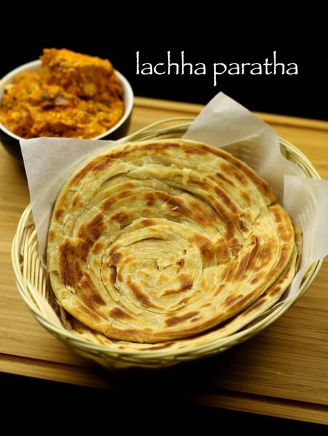 lachha paratha recipe, lachha parantha recipe with step by step photo, video recipe. lachha paratha is a popular paratha recipe with multiple layers Hebbars Kitchen Recipes, Lachha Paratha Recipe, Lachha Paratha, Hebbar's Kitchen, Pembuat Roti, Indian Flat Bread, Paratha Recipe, Roti Recipe, Cooking Bread