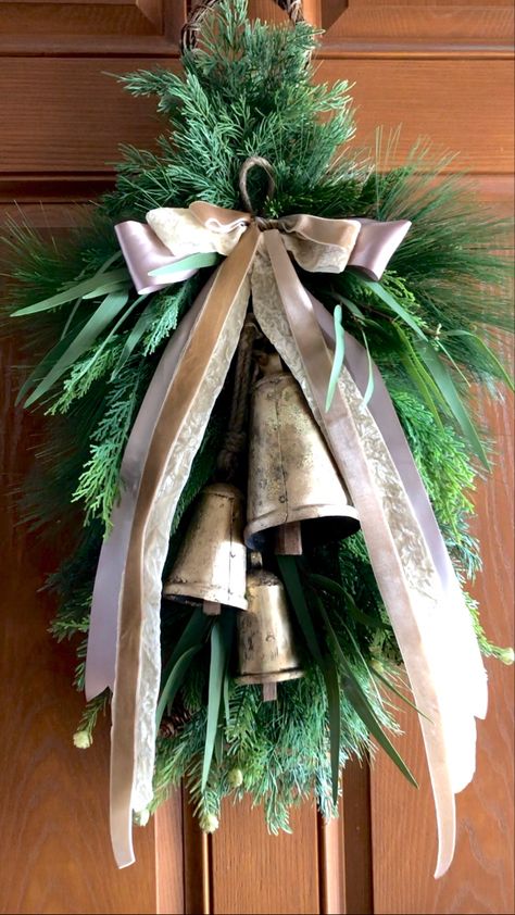 Christmas Wreaths With Bells For Front Door, Front Door Christmas Swag, Gold Bells Christmas Decor, Double Door Christmas Decor, Gate Wreath, Christmas Swags For Front Door, Christmas Swags Ideas, Wreaths With Bells, Christmas Shop Displays